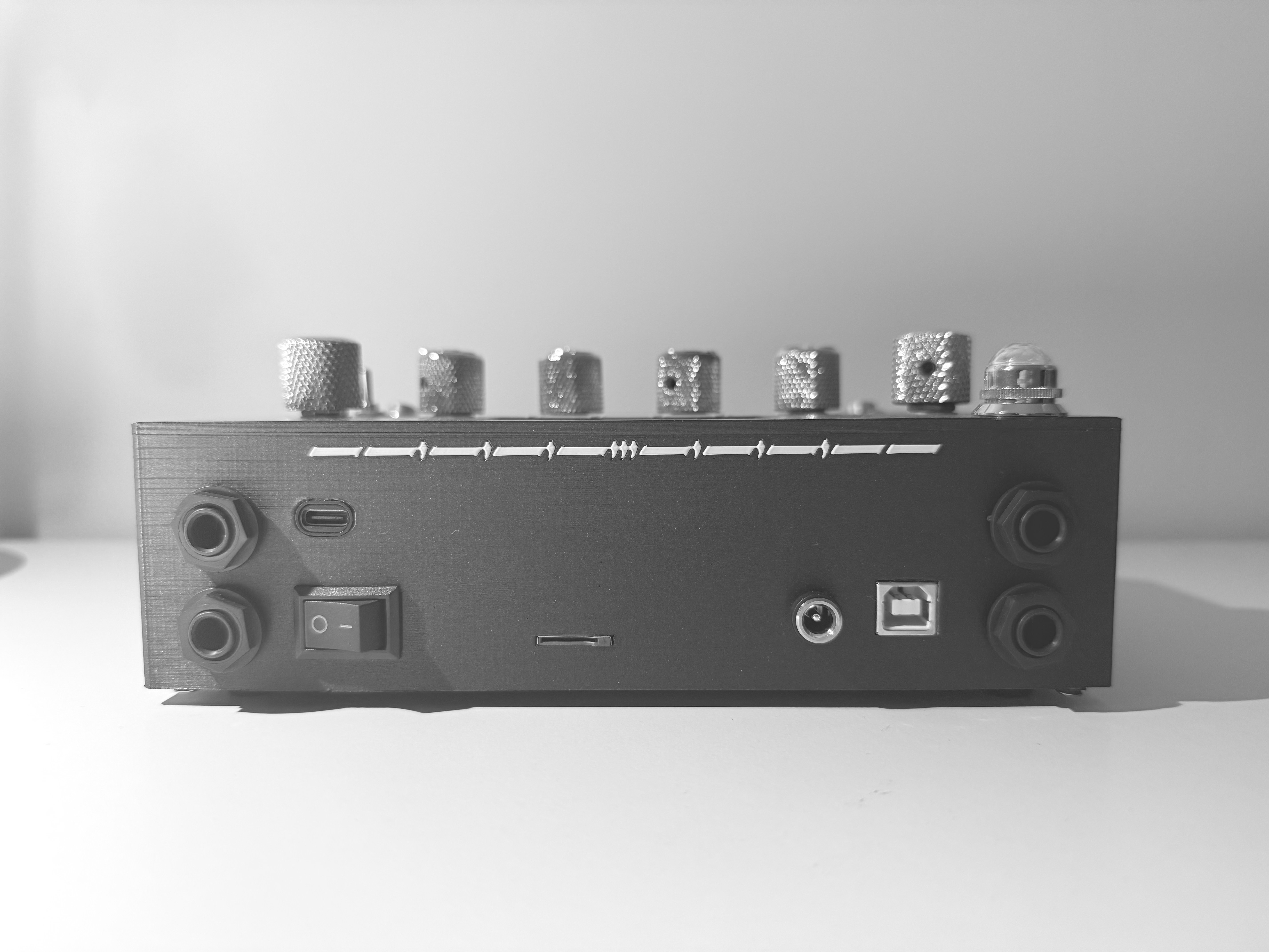 Front profile of BonesFX and its gothic enclosure pattern